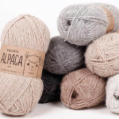 Drops - Alpaca - Couleur: 100 - Naturel, 101 - Blanc, 501 - Gris Clair, 506 - Gris Foncé, 517 - Gris Moyen, 607 - Brun clair, 618 - Nugat, 2020 - Nougat Clair, 2915 - Orange, 2917 - Turquoise, 2918 - Turquoise Foncé, 2919 - Pétrole Clair (Disc), 2925 - Rouille, 3112 - Rose Tendre, 3140 - Rose Pâle, 3620 - Rouge, 3650 - Grenat, 3969 - Rouge/Violet (Disc), 4010 - Lavande Clair, 4050 - Lilas Clair (Disc), 4400 - Violet Foncé, 4434 - Améthyste, 5575 - Bleu Marine, 6309 - Pétrole Moyen, 6736 - Bordeaux, 7233 - O